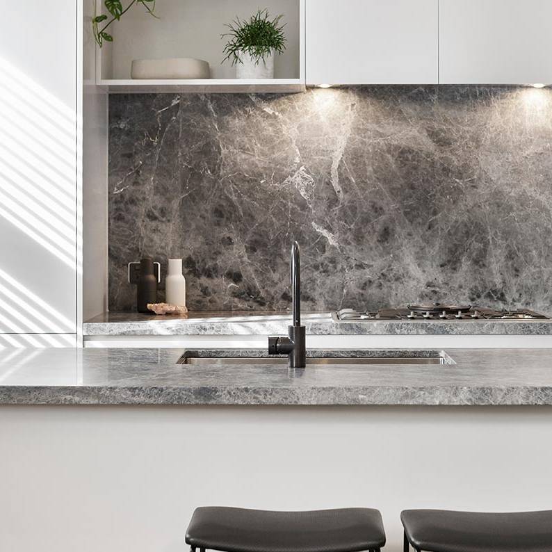 Gray marble counter top with gray walls